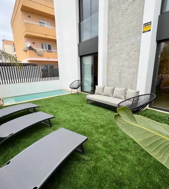 Resa estates ibiza sales ground floor apartment pool Ibiza garden 1.jpg